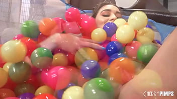 Sera Ryder is so cute playing in her ball pit! Her man, Mike Stefano, thinks she looks cute and loves how she handles balls! He gets in there with her and she happily goes down on him!